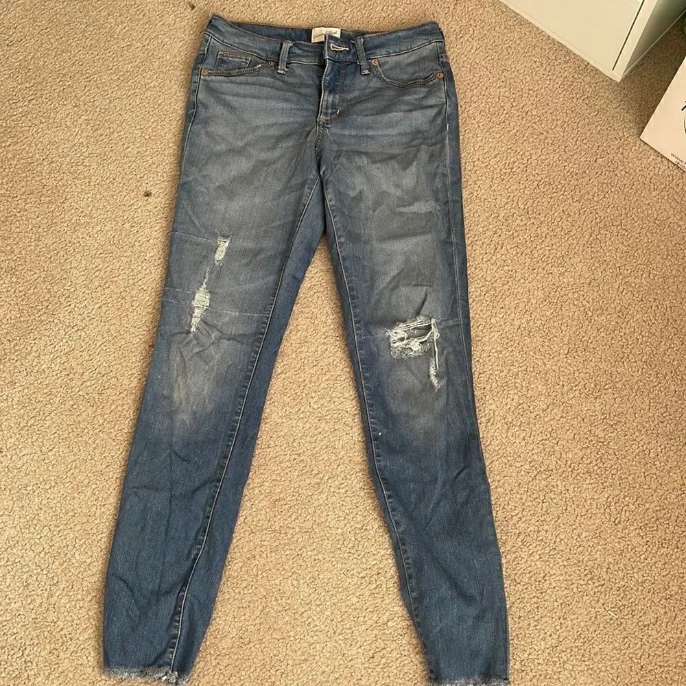 Distressed high rise skinny jeans